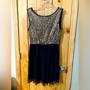 Issi brand size L glittery gold and black dress
